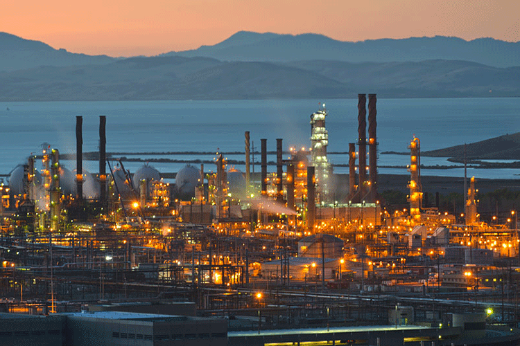 A photo of an oil refinery in Richmond at dusk